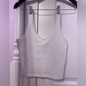 Selling this white top. Never worn it before has no stains and is brand new!